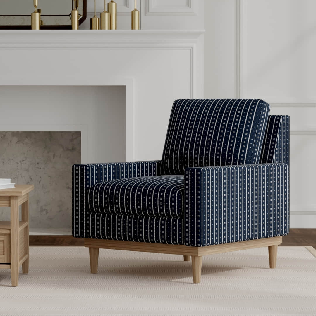 Benny Blueberry upholstered on a mid century modern chair