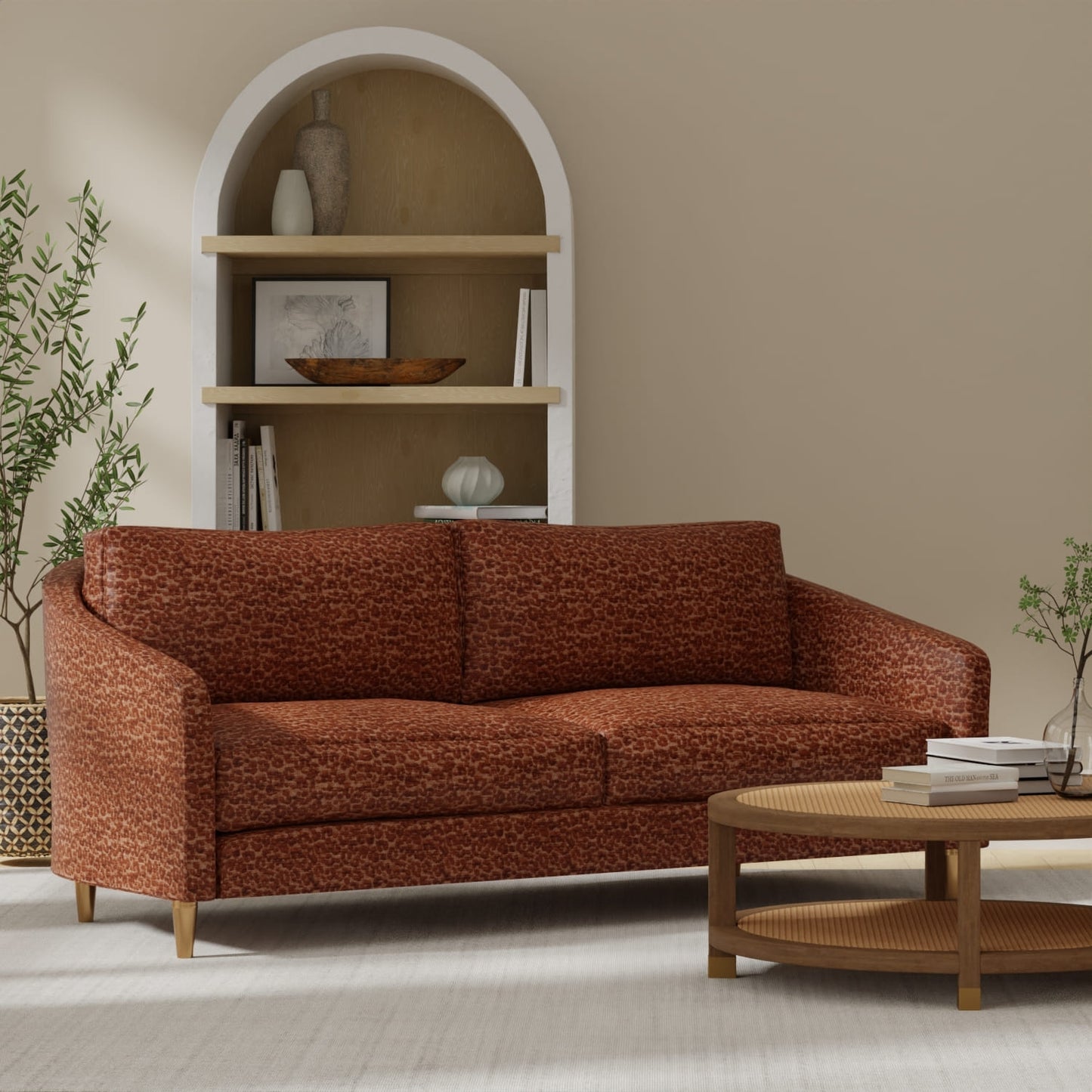 Bobbi Burnt Orange upholstered on a couch