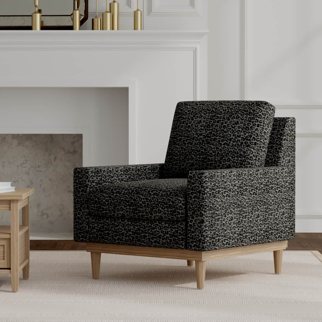 Bobbi Graphite upholstered on a mid century modern chair