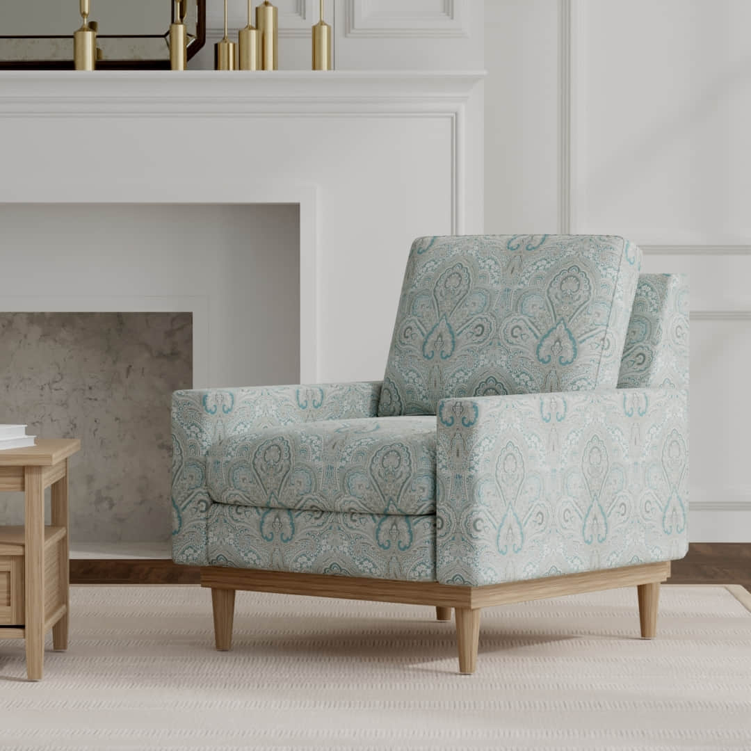 Dunbar Turquoise upholstered on a mid century modern chair