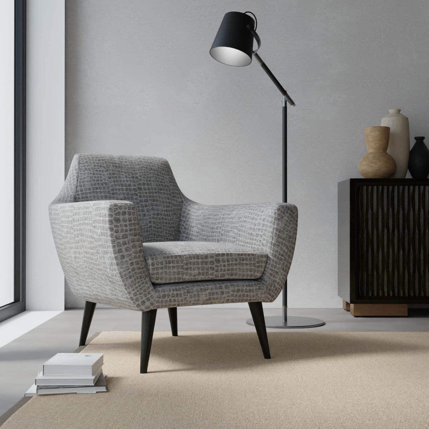 Electra Charcoal upholstered on a contemporary chair