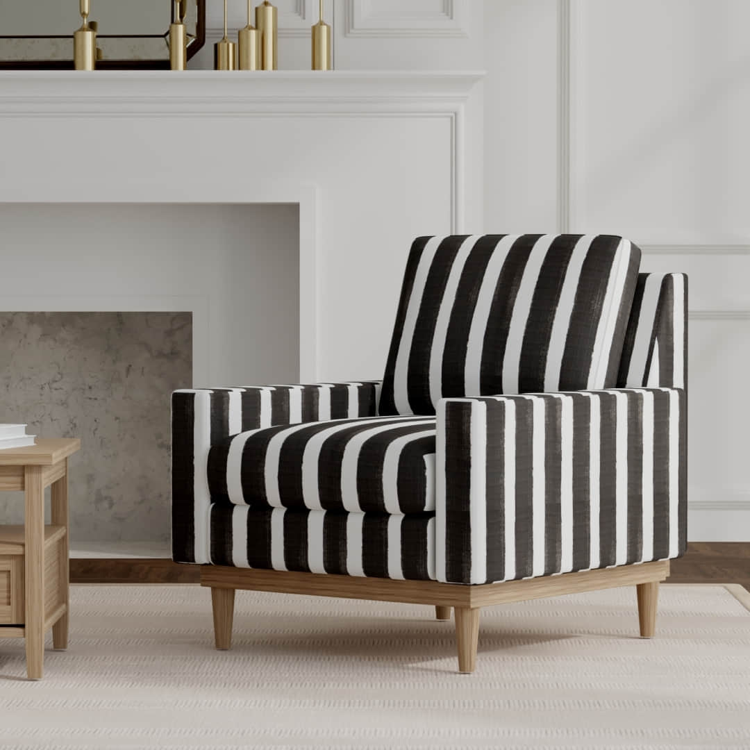 Michaela Coal upholstered on a mid century modern chair