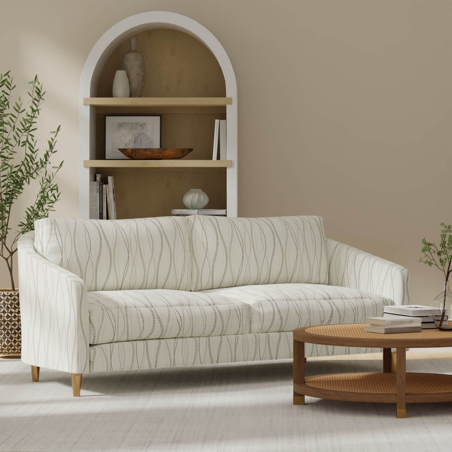 Natalie Coin upholstered on a couch